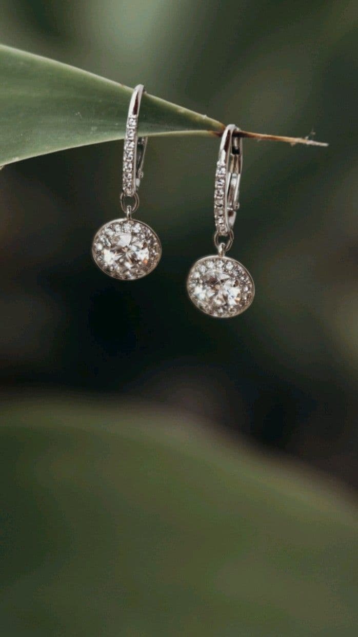 A stylist presenting jewellery at a customer's home